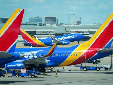 A Southwest Airlines plane takes off after flights resumed at Dallas Love Field Airport on...
