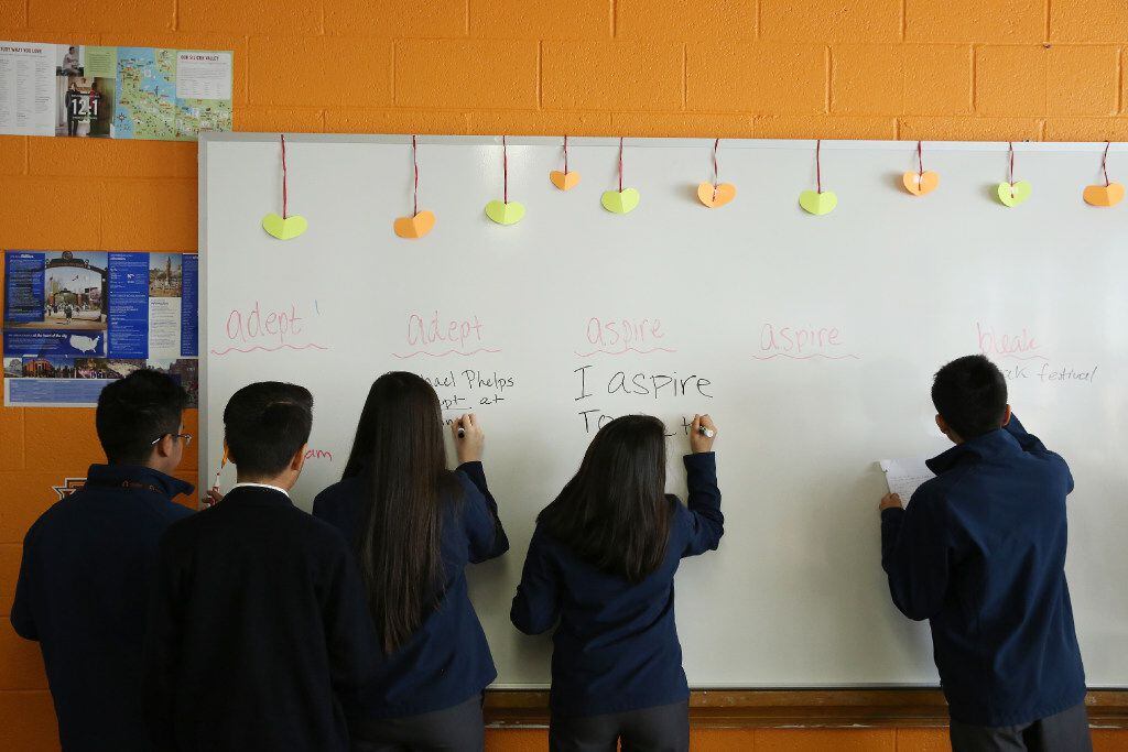 Freshman students work on their vocabulary in the classroom of Kathryne Brodie at Cristo Rey...