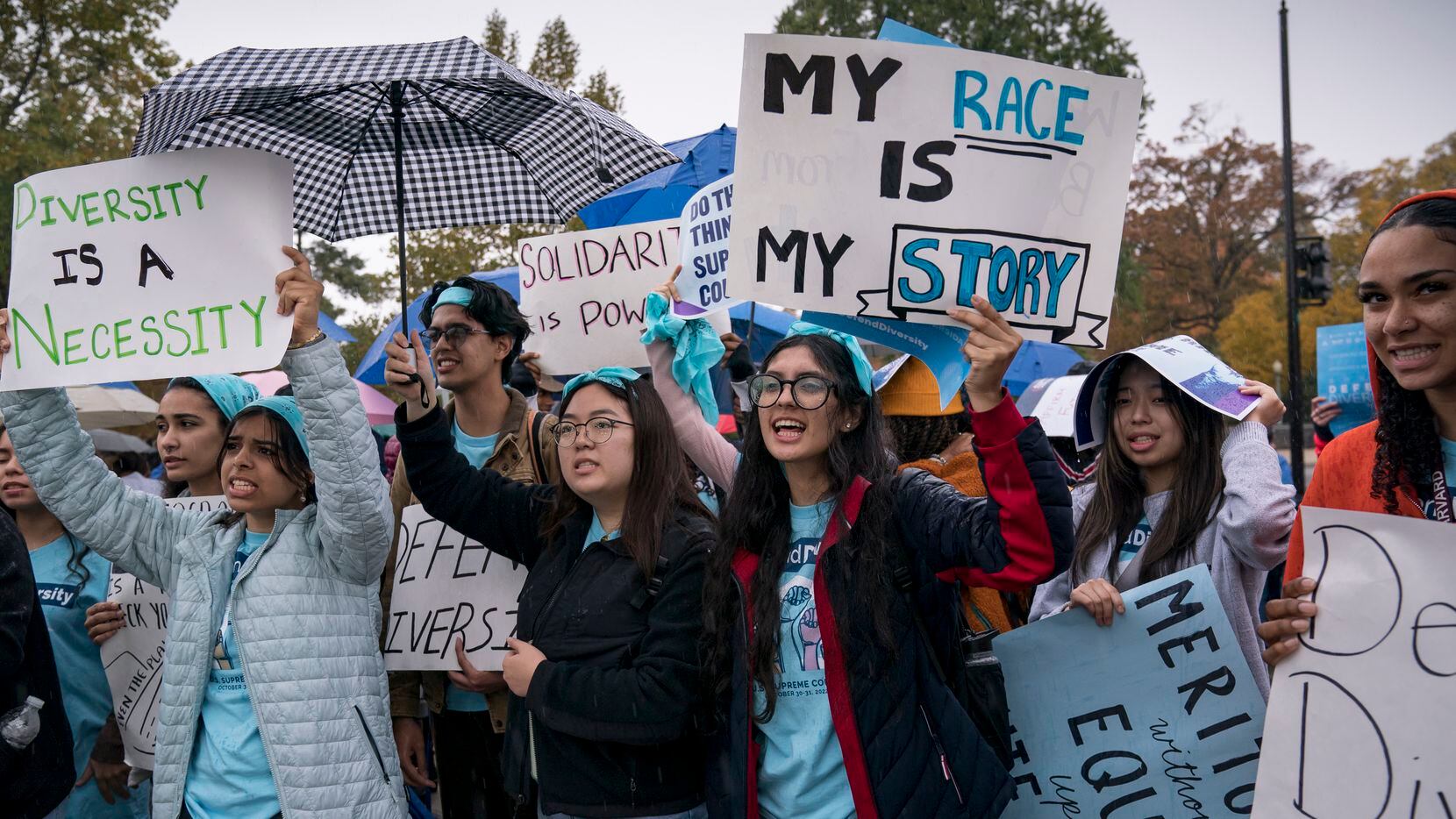 Students and activists rally outside the Supreme Court as the court before oral arguments in...