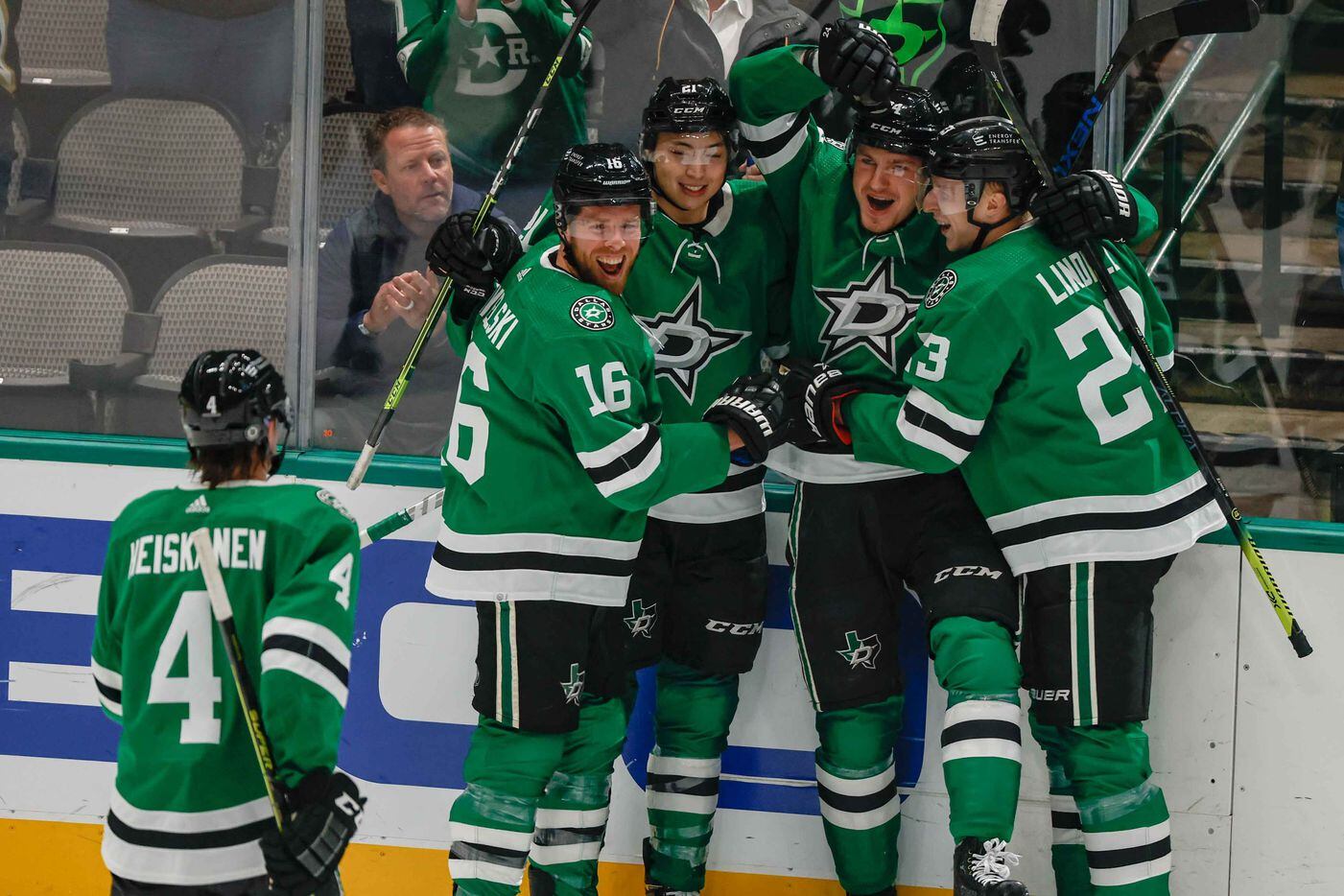 Dallas Stars left wing Roope Hintz (24) celebrates his goal against the Arizona Coyotes with his teammates left wing Jason Robertson (21), center Joe Pavelski (16), defenseman Esa Lindell (23) and defenseman Miro Heiskanen (4) during first period at the American Airlines Center in Dallas on Monday, December 6, 2021.