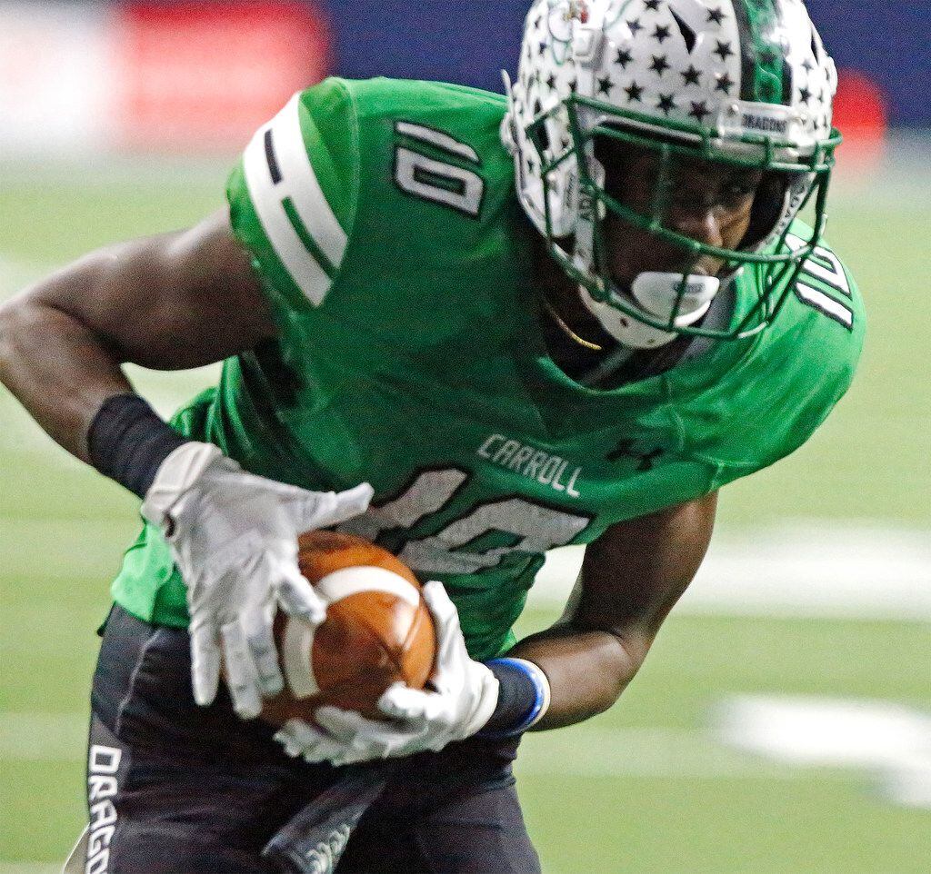 Southlake Carroll High School RJ Mickens (10) runs in for a touchdown after the catch during the first half as Southlake Carroll High School hosted Desoto High School in a class 6A Division II area-round playoff game at The Star in Frisco on Saturday, November 25, 2017. (Stewart F. House/Special Contributor)