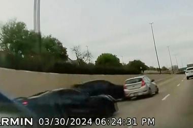 In this screen grab taken from dash camera video provided by Bill Nabors, two speeding...