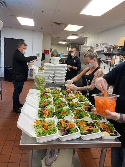 Bar Louie in Allen donated and prepared more than 300 meals for local health care...