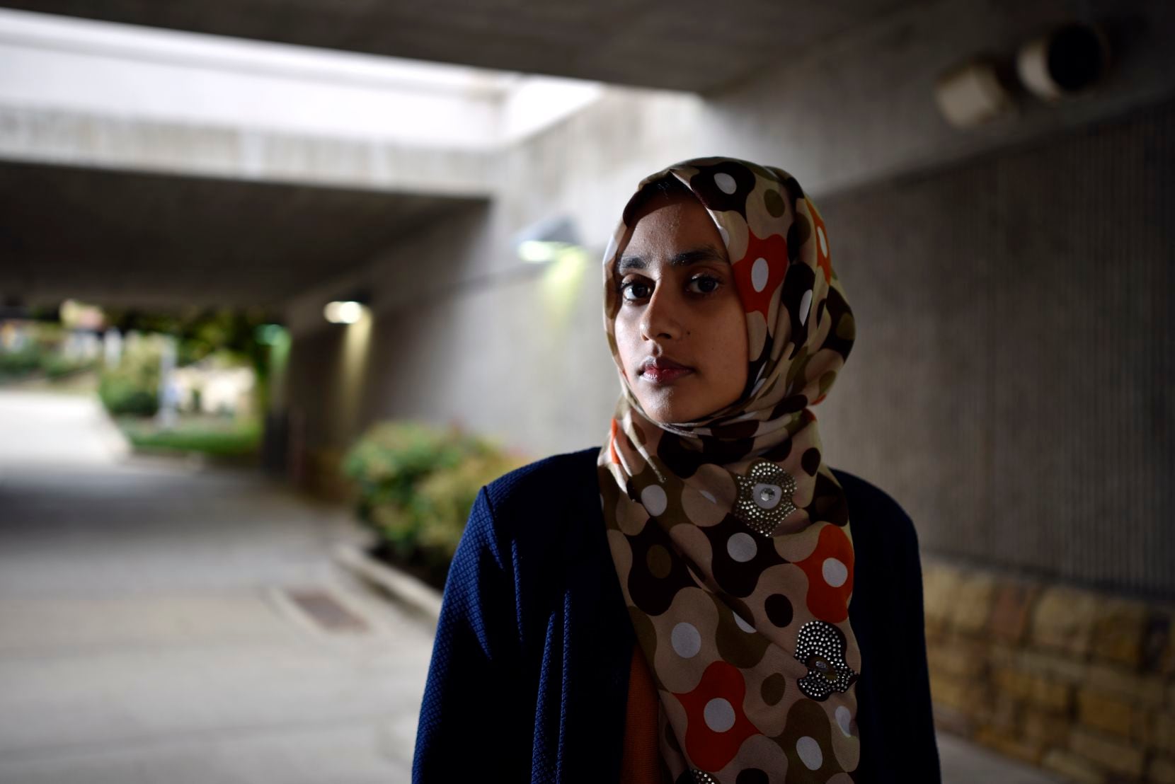 Aysha Khan, 21, a Muslim woman, rides the DART from Arapaho Center Station in Richardson to...