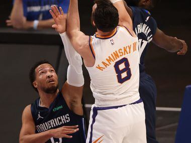Dallas Mavericks forward Tim Hardaway Jr. (11) blocks a shot attempt from Phoenix Suns...