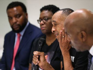 Bertrum Jean, the father of Botham Jean, spoke next to his wife, Allison, and attorneys Lee...