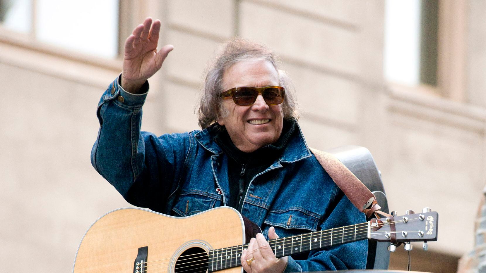 FILE - Don McLean rides a float in the Macy's Thanksgiving Day Parade in New York. Feb. 22,...