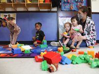 Teacher Erika Torres Rosado plays with 18-24 month olds at Kaleidoscope Child Development...