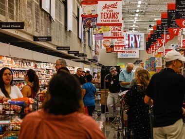 Shoppers continued to pack the aisles over the weekend of H-E-B's first namesake grocery...