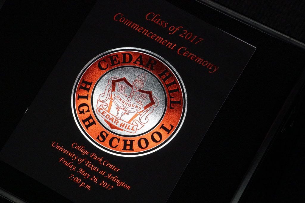 A program lays on a chair at Cedar Hill High School's graduation at the College Park Center...