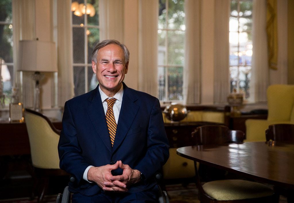 Gov. Greg Abbott, shown at the Governor's Mansion in January, has yanked his endorsement of...