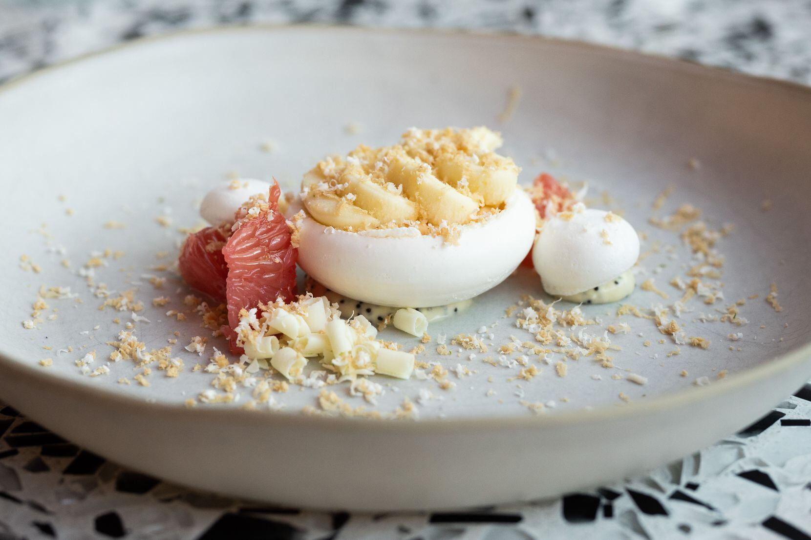 Pavlova, grapefruit crémeux, lime toffee and toasted poppy seed, from the restaurant...