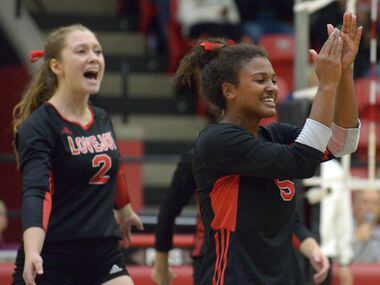 Lovejoy's Cecily Bramschreiber (5) cheers with teammates after a point during a high school...