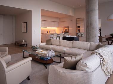 The living room area inside a model condo at the Hall Arts Residences.