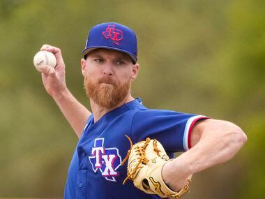 Texas Rangers pitcher Jon Gray throws in a “B” game on the back fields against the Kansas...