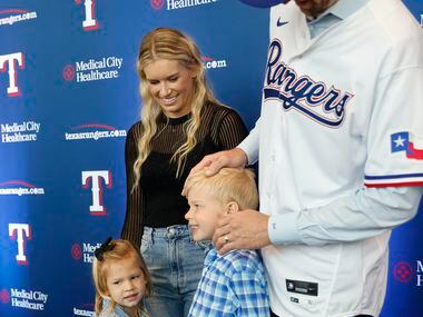 New Texas Rangers starting pitcher Jacob deGrom posed photos with his wife Stacey Harris,...