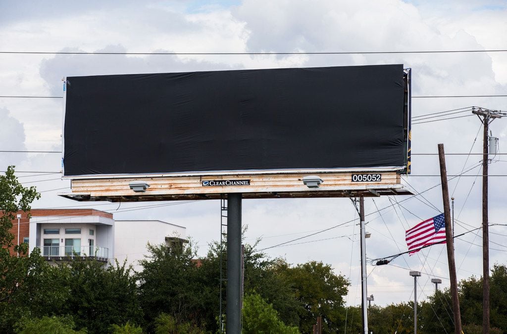 A covered billboard  near Baylor Scott & White Medical Center - Plano, on Friday.  