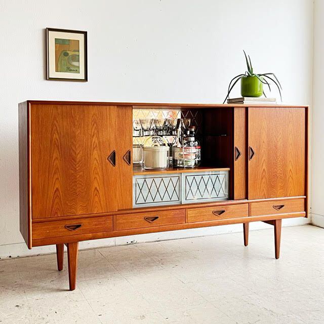 A brown 1960s cocktail cabinet