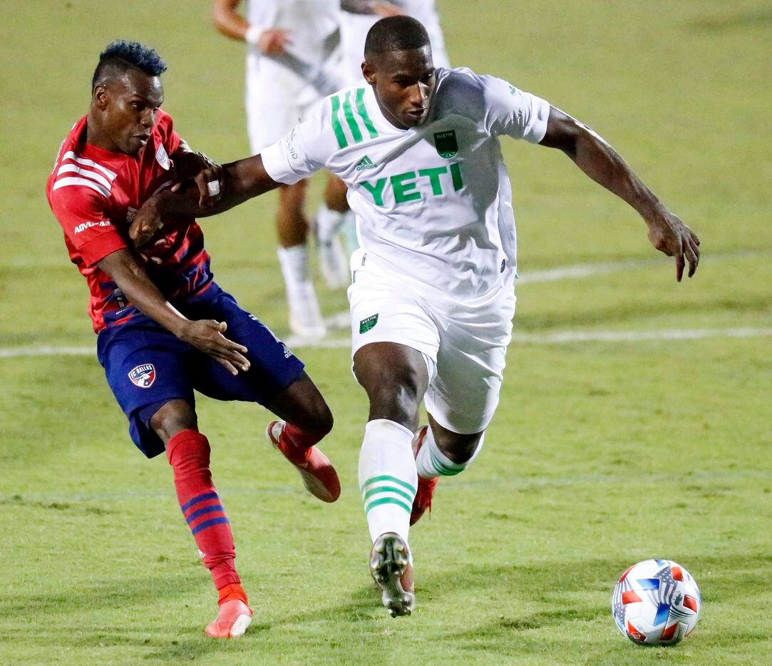 FC Dallas forward Jader Obrian (7) is shoved by Austin FC defender Jhohan Romana (3) during the second half as FC Dallas hosted Austin FC at Toyota Stadium in Frisco on Saturday, October 30, 2021. (Stewart F. House/Special Contributor)