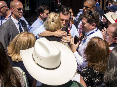 Texas Sen. Ted Cruz hugs a supporter during a "thank you" event on the third day of the...