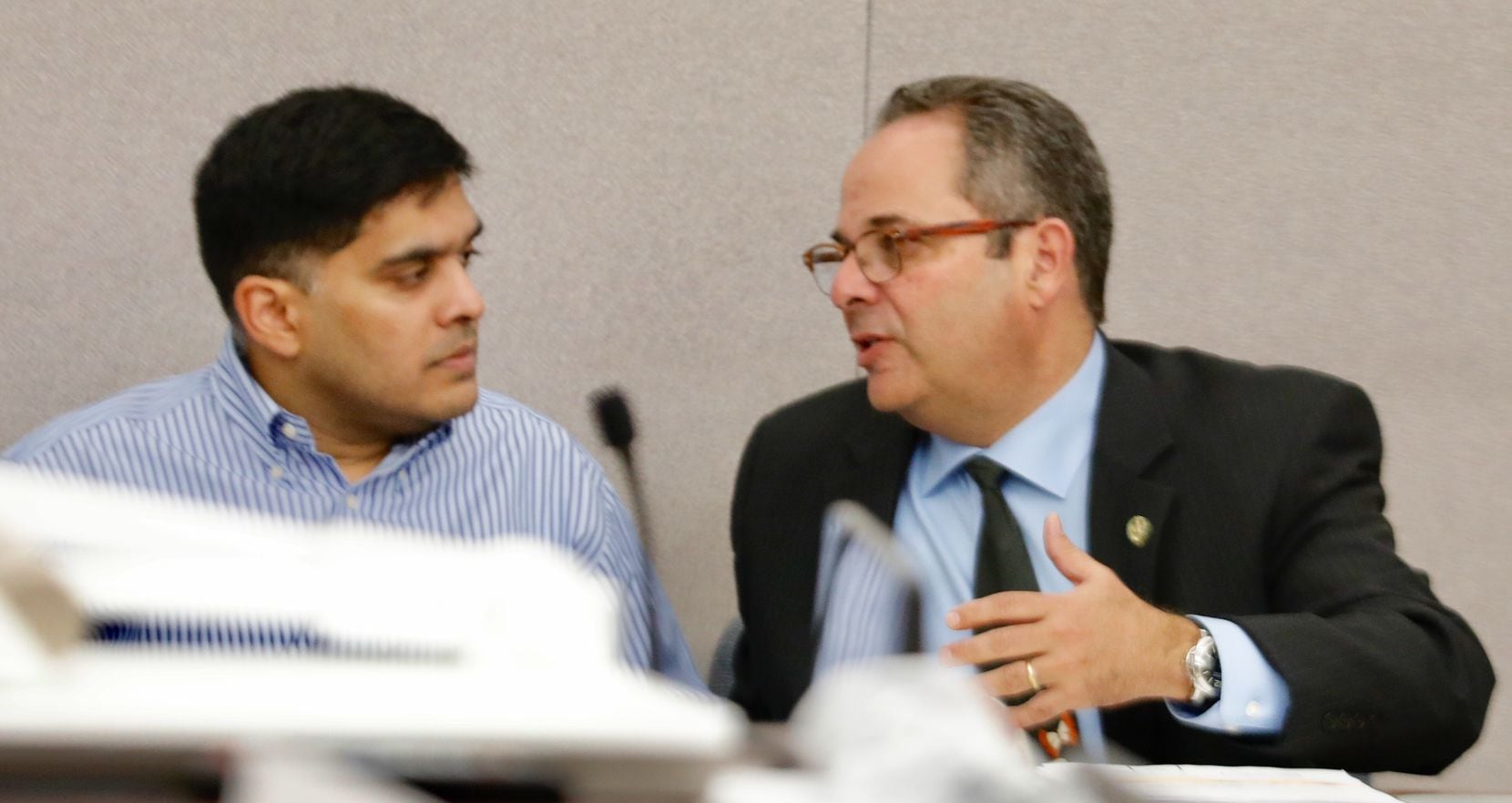 Rafael De La Gaza (right) talks to client Wesley Mathews during a custody hearing at the...