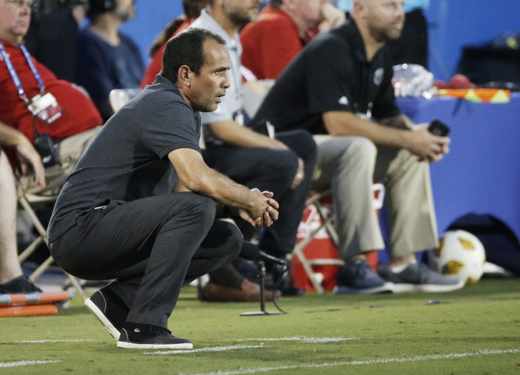 FC Dallas head coach Oscar Pareja looks on from the sidelines during the first half of an...