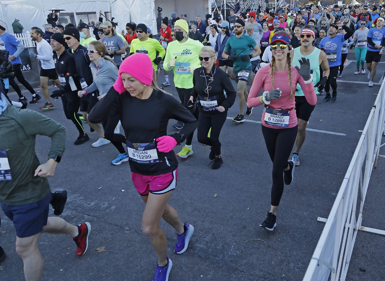 Runners begin the half marathon as the Dallas Marathon returned on Sunday, December 12,...