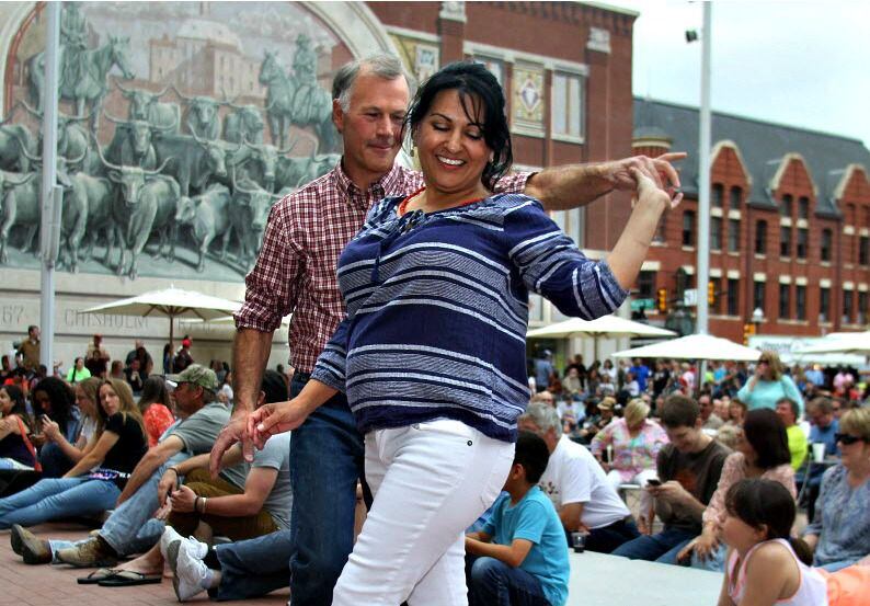 Kevin Delcarson dances with Rita Porter at Sundance Square during the Main Street Fort Woth...