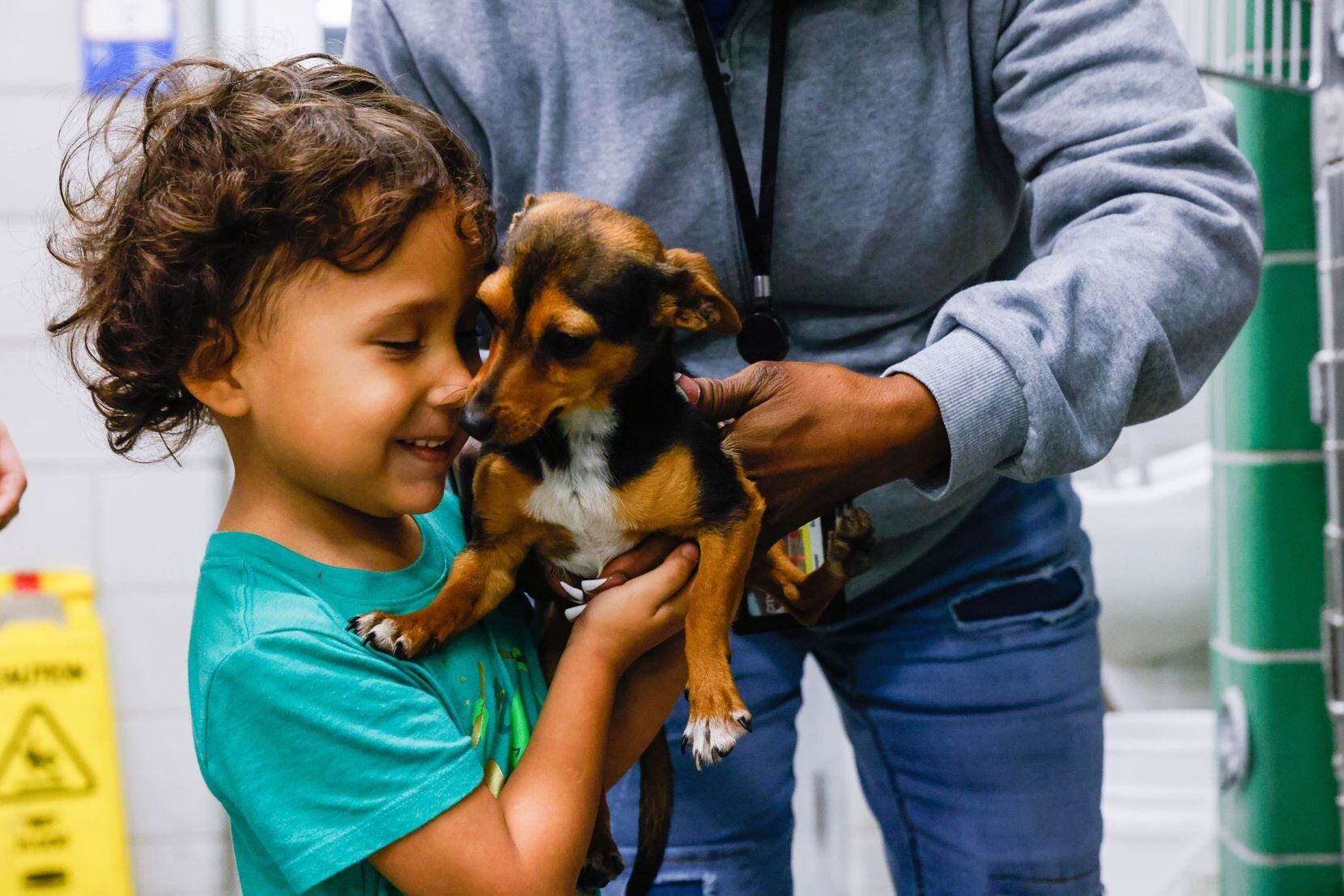 Xavier Gonzales, 4, got acquainted with Sparky at the Dallas Animal Services in Dallas on...