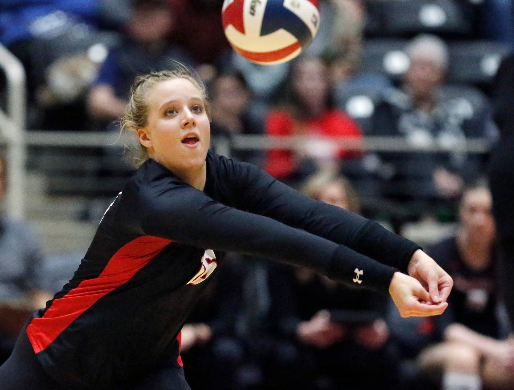 Colleyville Heritage High School's Ella Busey (16) makes a pass during game three as...