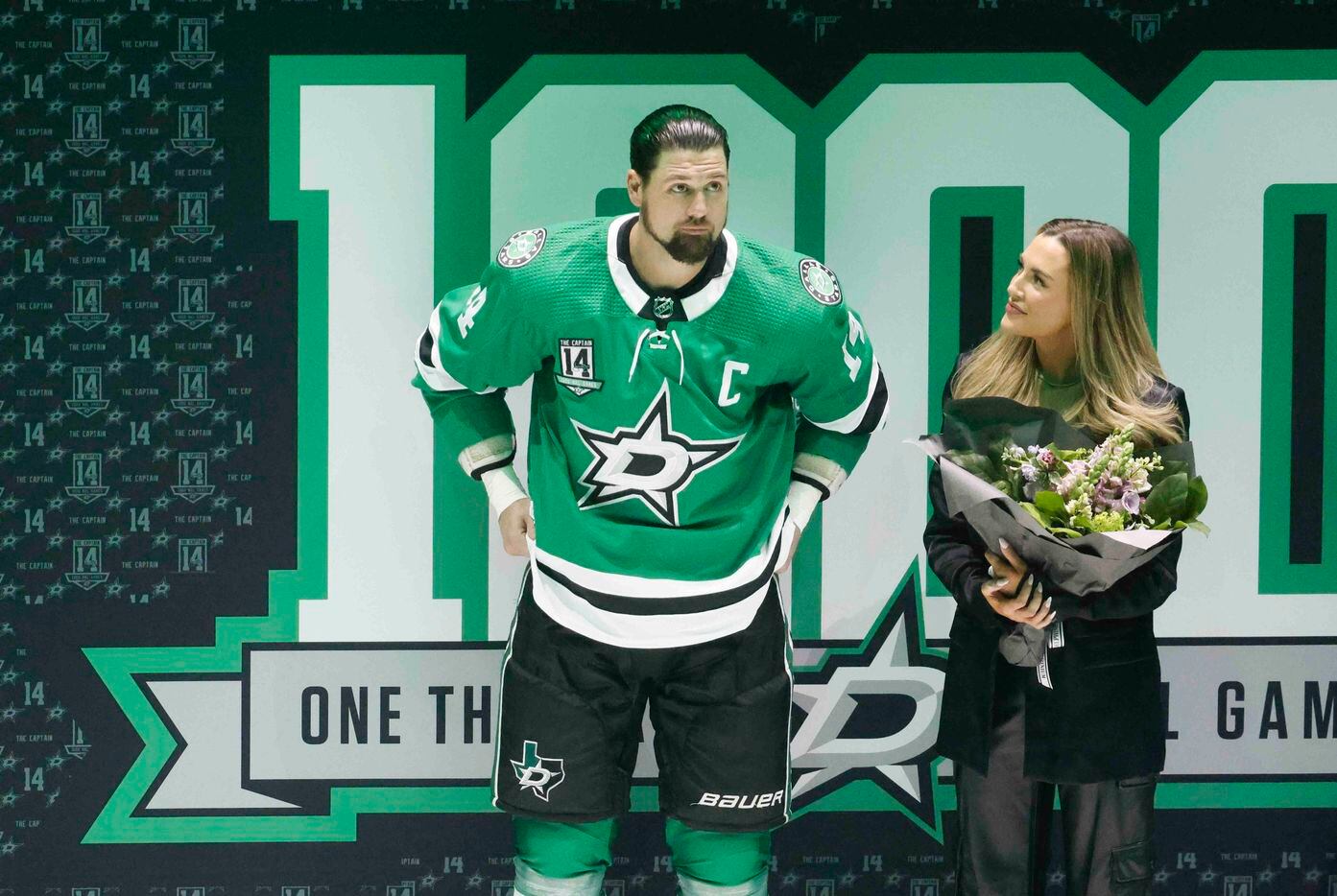 Dallas Stars left wing Jamie Benn (14) stands by his fiancee, Jessica Bennett during a...