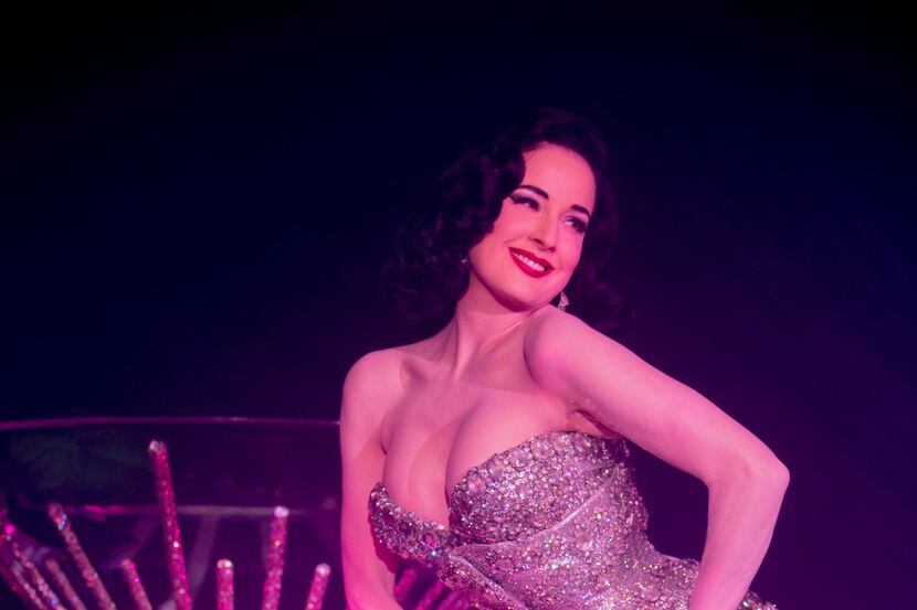 Burlesque star Dita von Teese performed in front of (and in) her giant martini glass at...