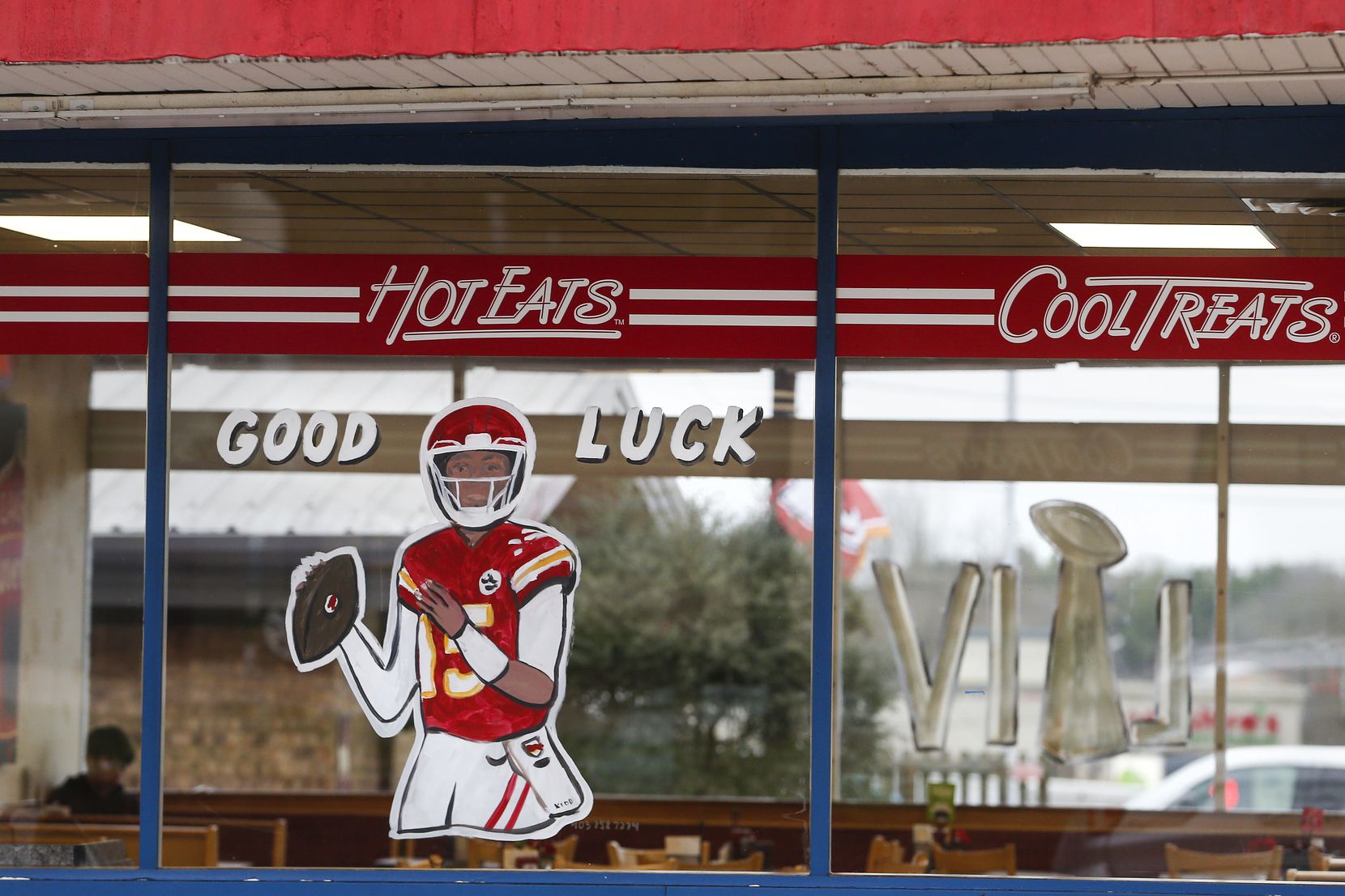 Painted restaurant windows in Whitehouse testify to the success Mahomes has found in the NFL.