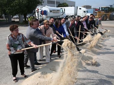 City and state officials at the ceremonial groundbreaking for Dallas Midtown on the site of...