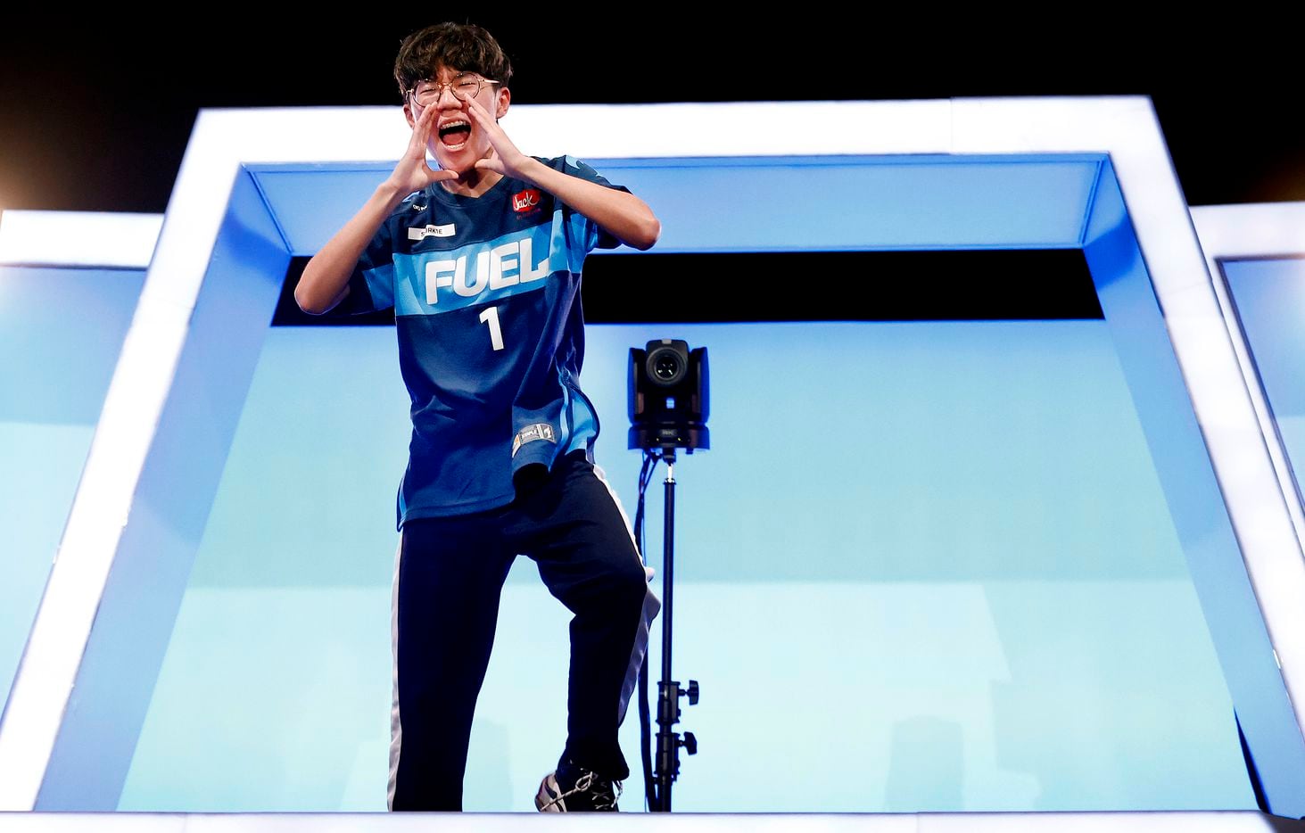 Dallas Fuel player Yeonghan 'Sp9rk1e' Kim acknowledges his fans that stuck around after their Overwatch League win against the Houston Outlaws at Esports Stadium Arlington Friday, July 9, 2021. Dallas Fuel defeated Houston in The Battle for Texas, 3-0. It was the first in-person live competition for fans in over a year. Houston competed from their hometown. (Tom Fox/The Dallas Morning News)