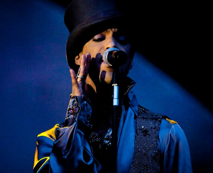 In this Aug. 6, 2011, file photo, Prince performs in Copenhagen, Denmark.  