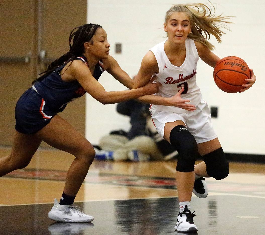Frisco Liberty High School guard Lily Ziemkiewicz (3) is fouled by McKinney North High...