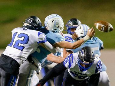 Dallas Christian defensive lineman Jackson Ivy (12) forces an incompletion from Houston...
