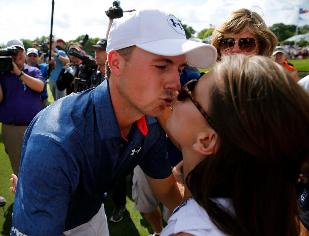 Jordan Spieth gives his girlfriend Annie Verret a kiss after winning the Dean and Deluca...