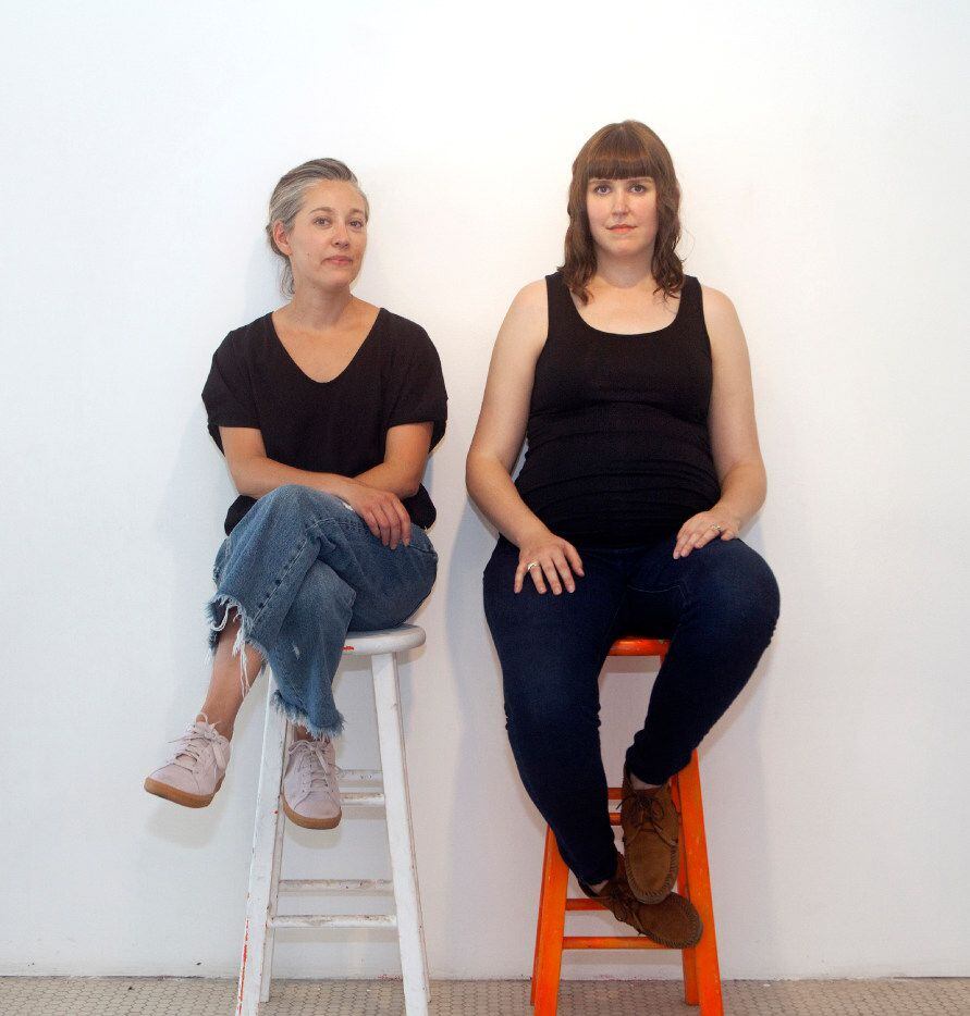 Artists Lucia Simek (left) and Cassandra Emswiler Burd photographed at their installation ...