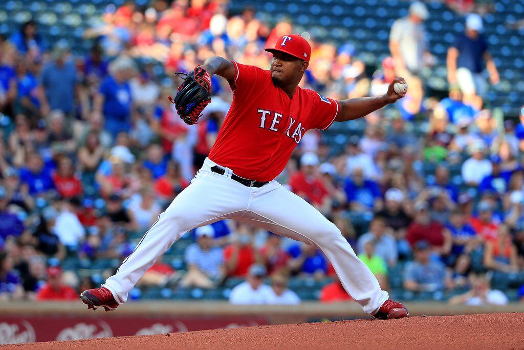 ARLINGTON, TX - JUNE 15:  Yohander Mendez #65 of the Texas Rangers pitches against the...