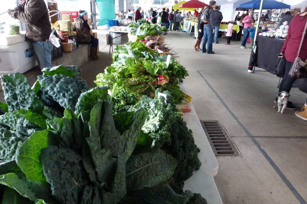 Denton Creek Farm's table is full of kale, chard, beets and more at the Dallas Farmers Market.