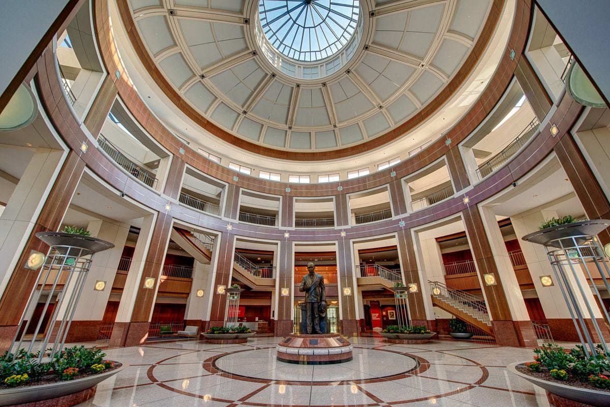Penney founder James Cash Penney's statue sits in the atrium at the retailer's Plano...