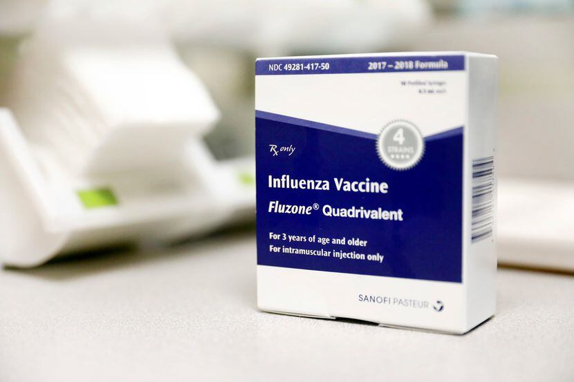 A package of influenza shots are ready to be administered at the Dallas County Health and...