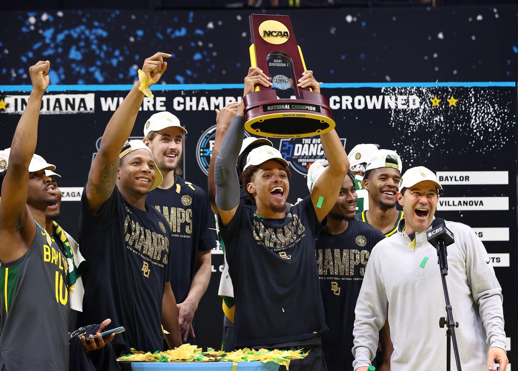 INDIANAPOLIS, INDIANA - APRIL 05: The Baylor Bears celebrate with the trophy after their win against the Gonzaga Bulldogs in the National Championship game of the 2021 NCAA Men's Basketball Tournament at Lucas Oil Stadium on April 05, 2021 in Indianapolis, Indiana. (Photo by Jamie Schwaberow/NCAA Photos via Getty Images)