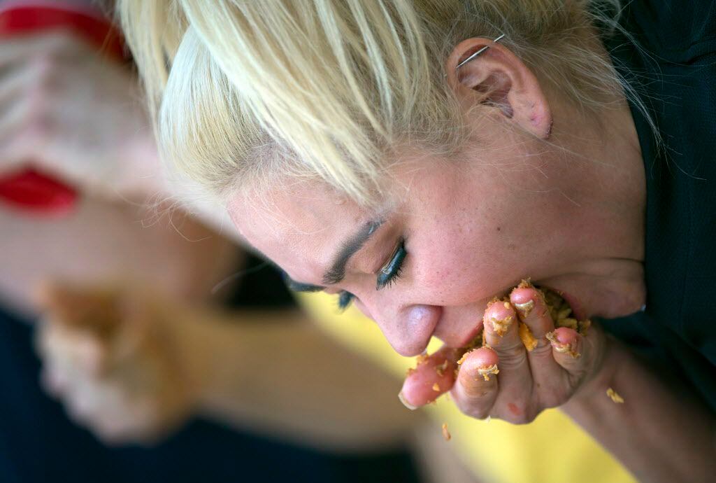 Miki Sudo crams her face with food during the Western Days Festival World Tamale Eating...