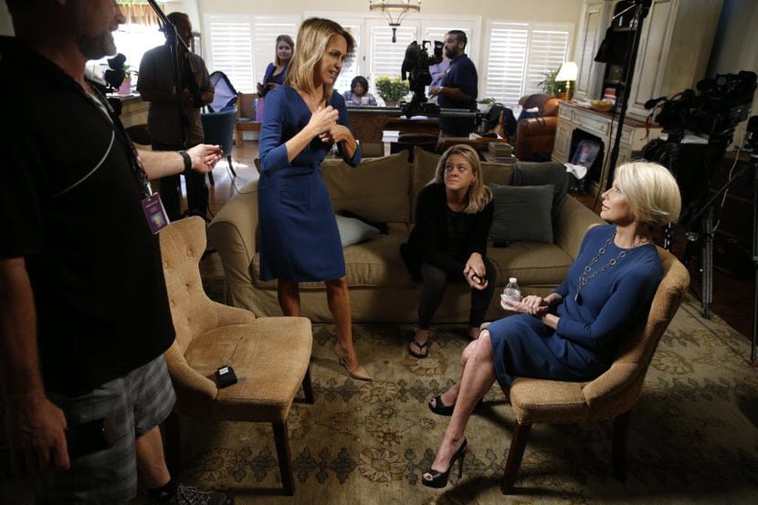 Dallas County DA Susan Hawk (right) and political adviser Mari Woodlief (center) sit down...