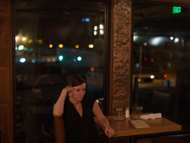 Host Kaley Palmer takes a moment to relax Tuesday, August 11, as the Barley and Board soft...
