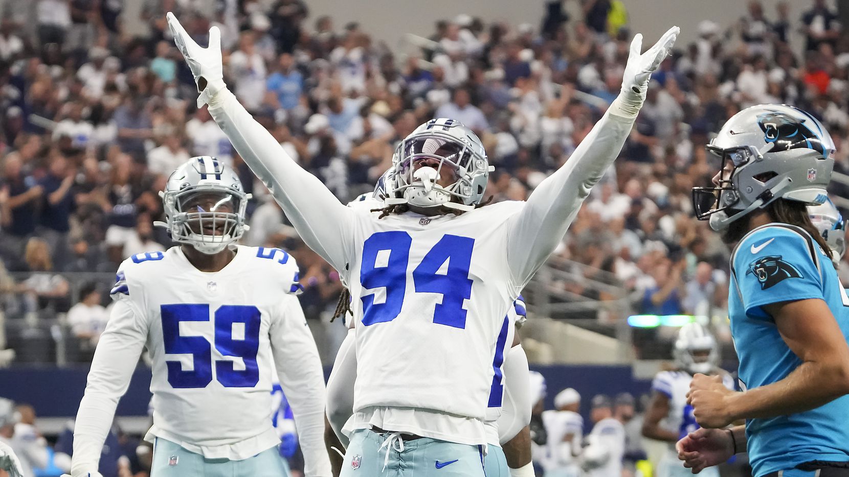 Dallas Cowboys defensive end Randy Gregory (94) celebrates after a sack during the first...