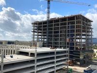 An office tower under construction at The Star in Frisco is among the more than 7 million...